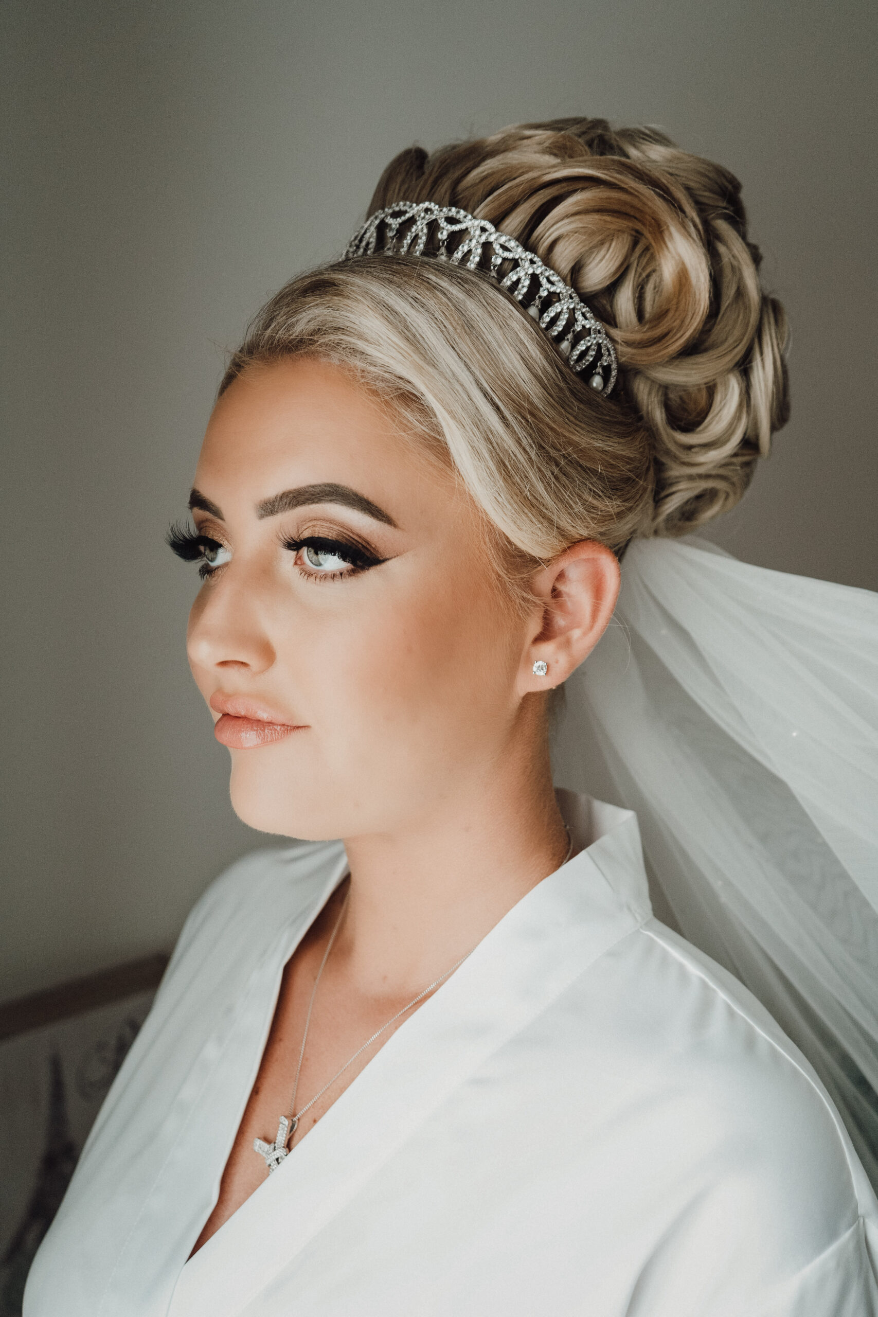 Bride's make-up on the wedding morning, a moment covered by half day wedding photography