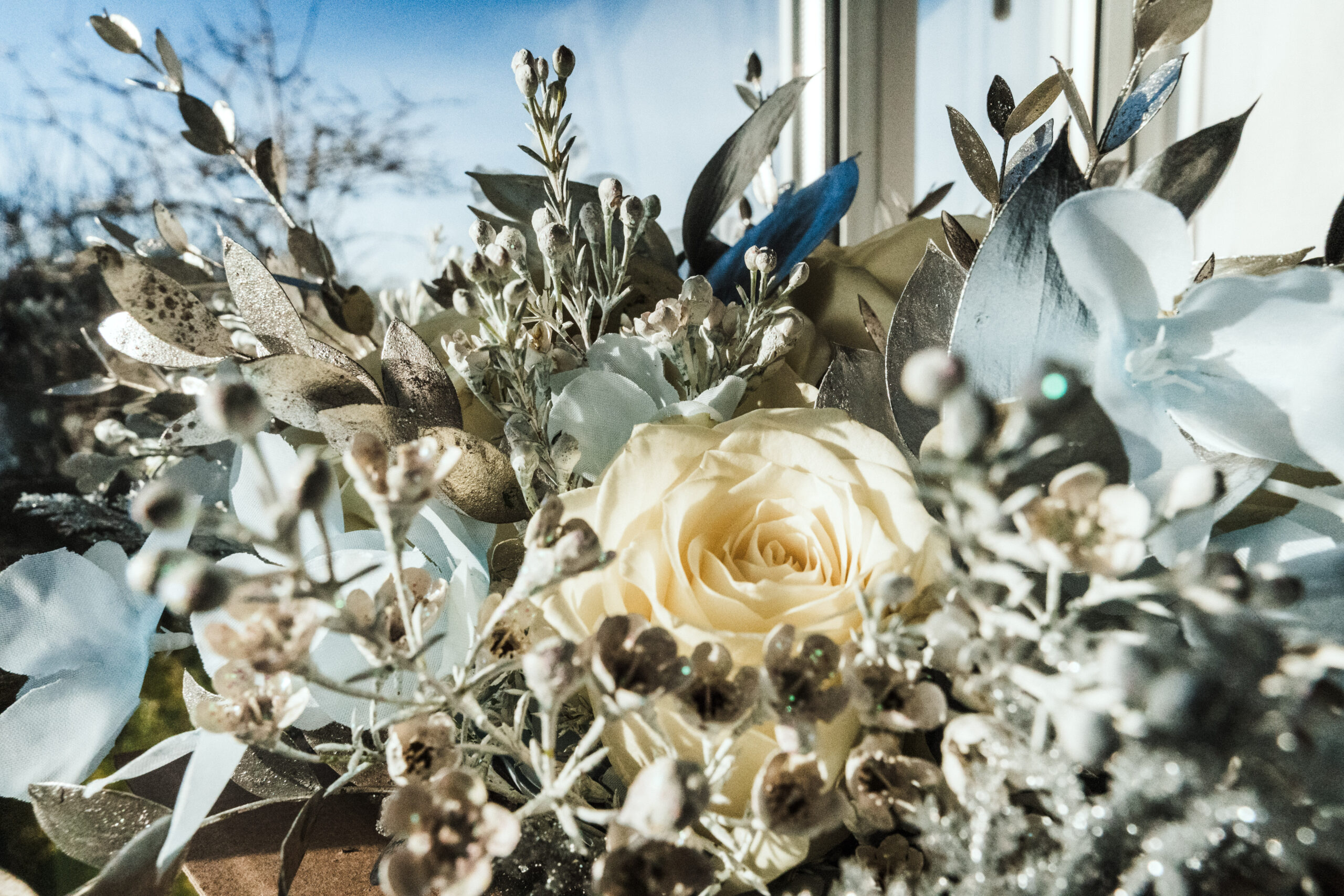 Close-up of a silver and ivory bridal bouquet, Southsea Castle wedding detail inspiration