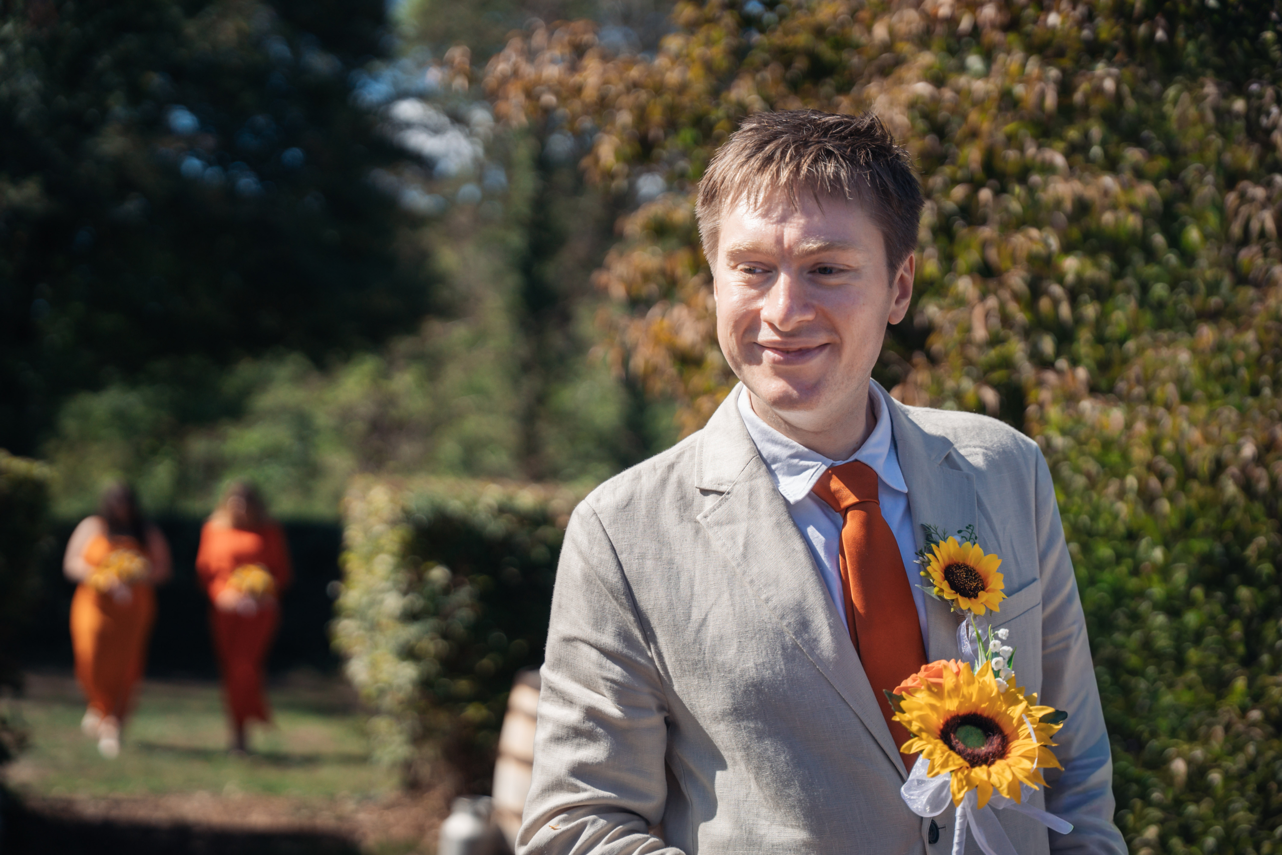 A groomsman with a sunflower buttonhole at a Hampshire wedding