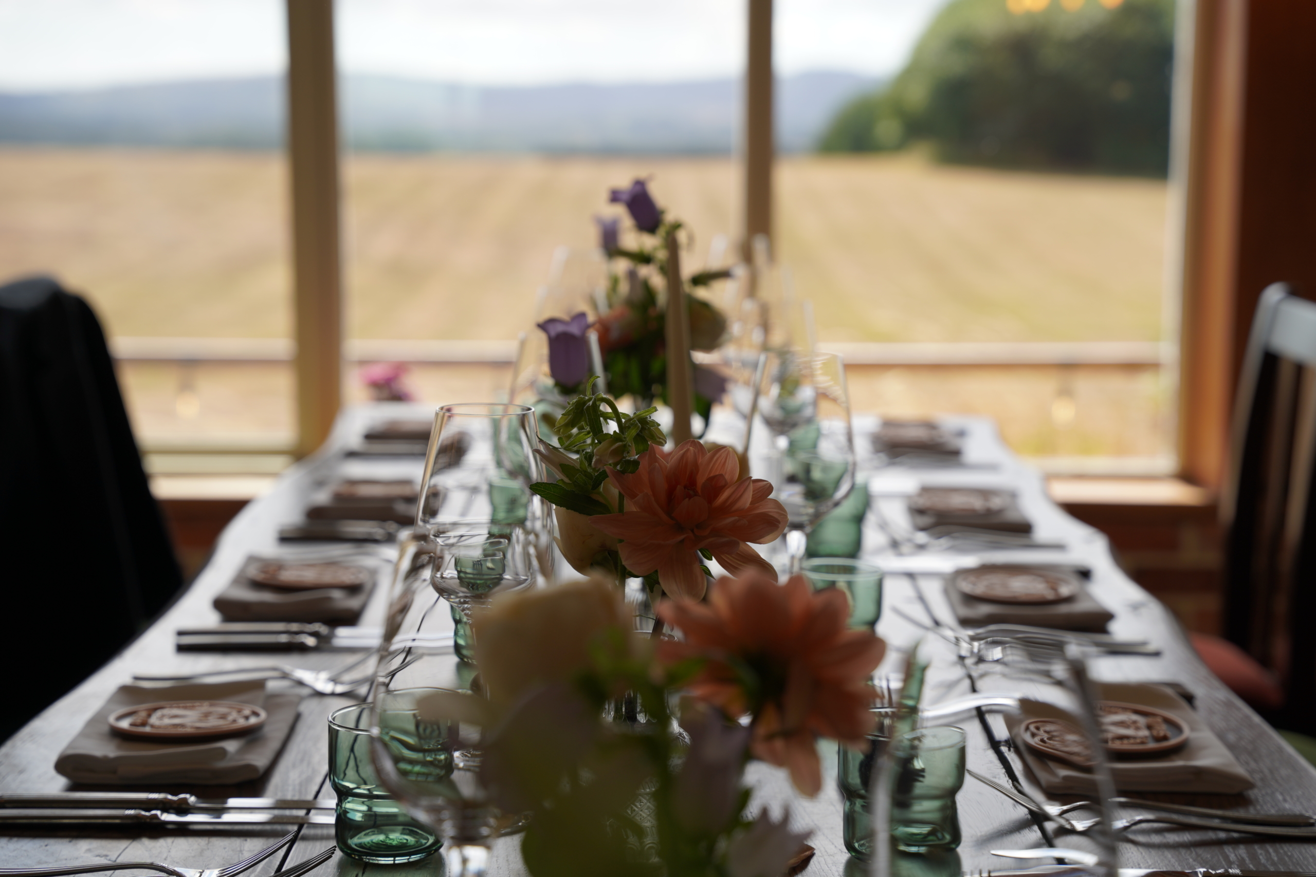 Long tables set for the wedding breakfast at a Hampshire wedding
