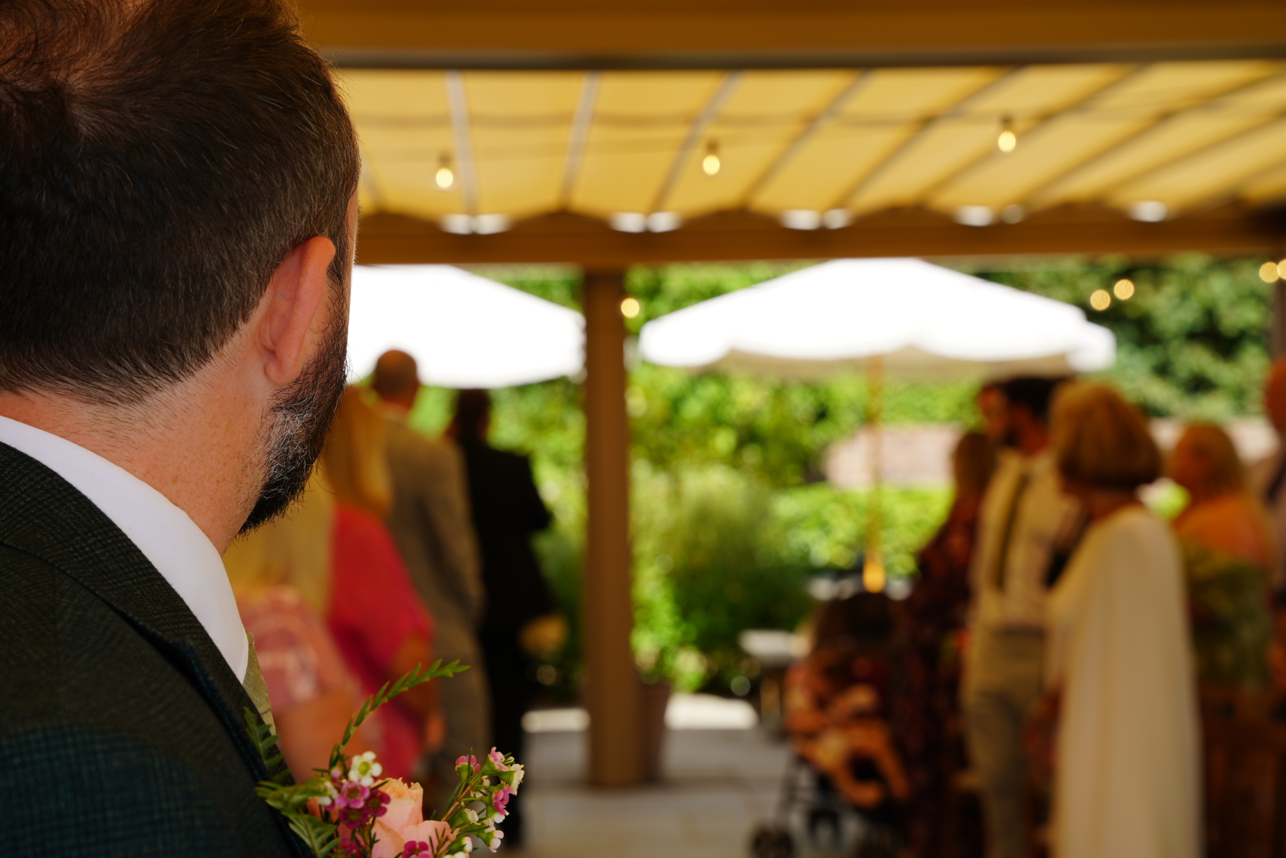Guests gathering for drinks at a New Forest wedding