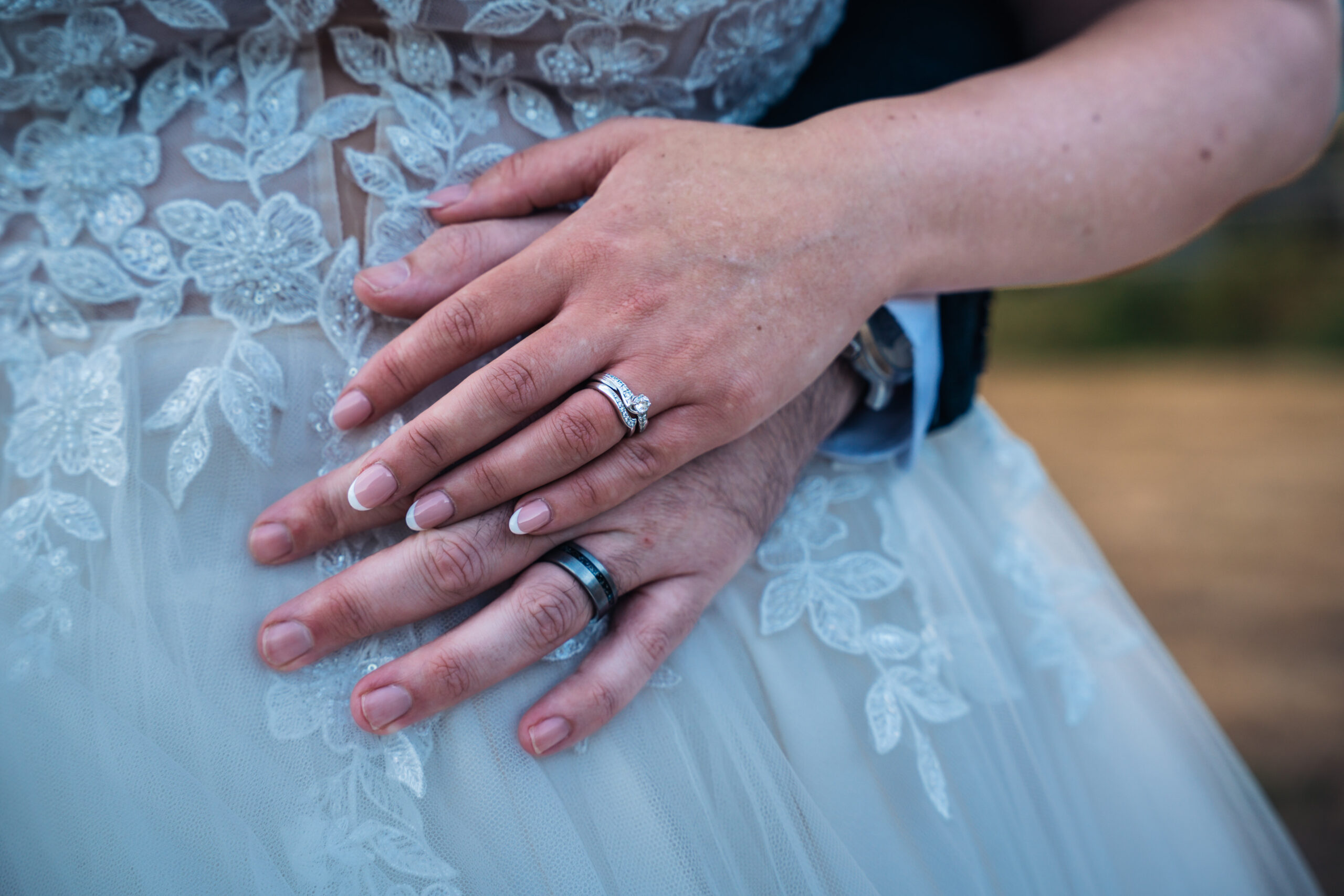 Close-up of wedding rings, illustrating wedding photographer cost in Hampshire