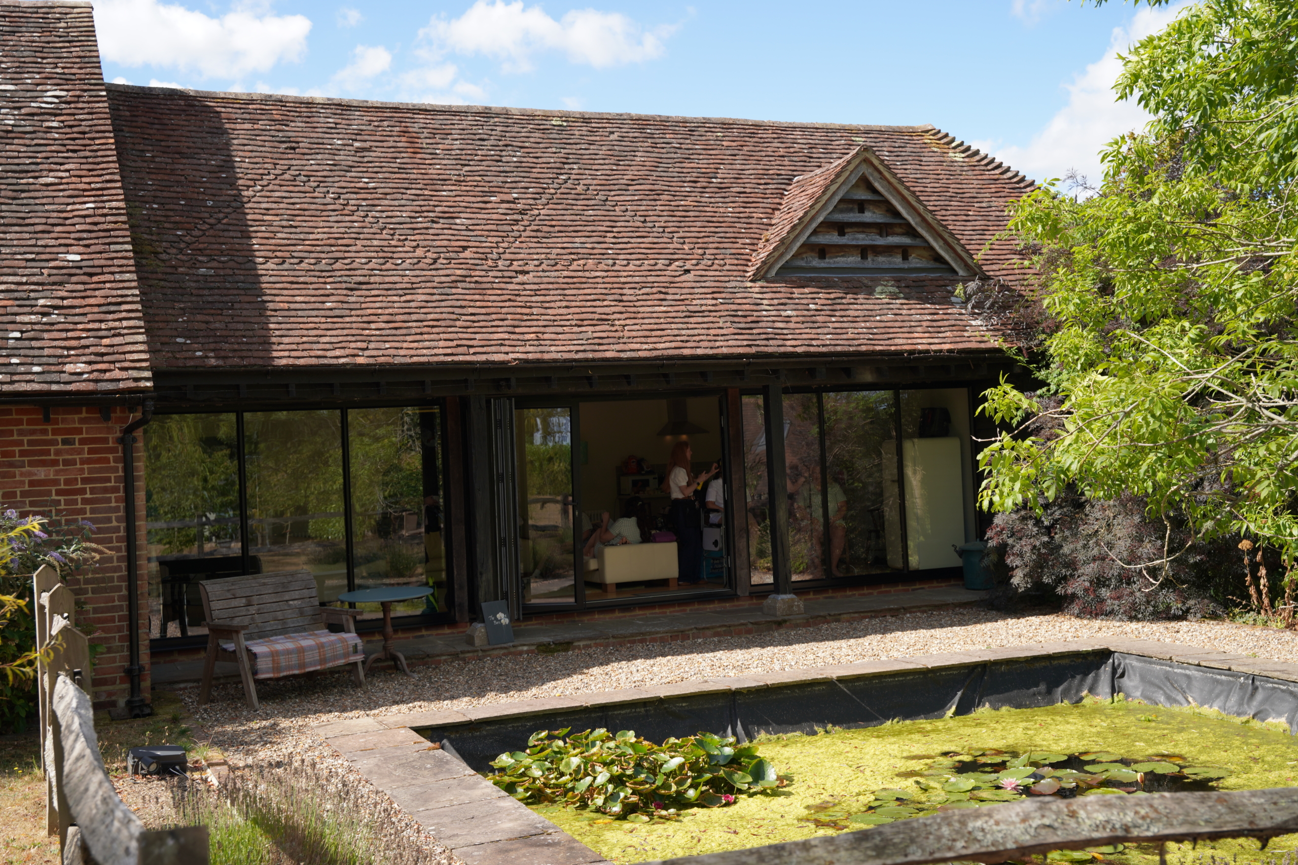 A rural wedding venue beside a pond in Hampshire